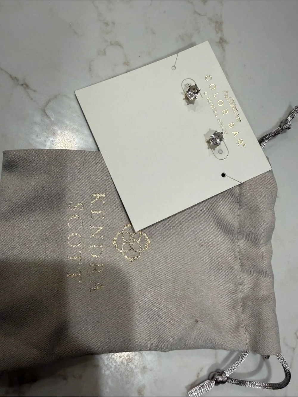 Kendra Scott round clear